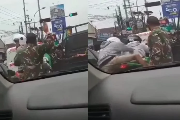 The bike rider was doing dirty acts on the red light, the young man reached from behind and removed all the arrogance, watch the video