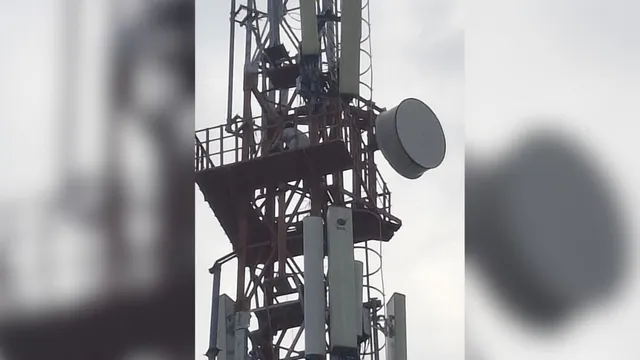 Former Tehsil employee climbs BSNL tower in New Tehri; alleges dismissal from service. Former Tehsil employee climbs BSNL tower in New Tehri; alleges dismissal from service.